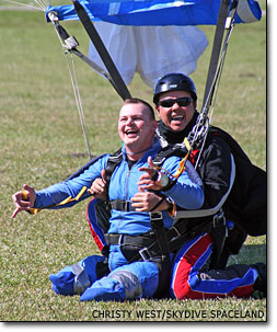 Josh Wells lands with a big smile at Skydive Spaceland