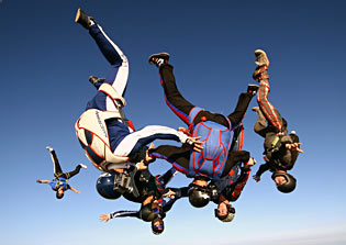 Experienced skydivers freeflying